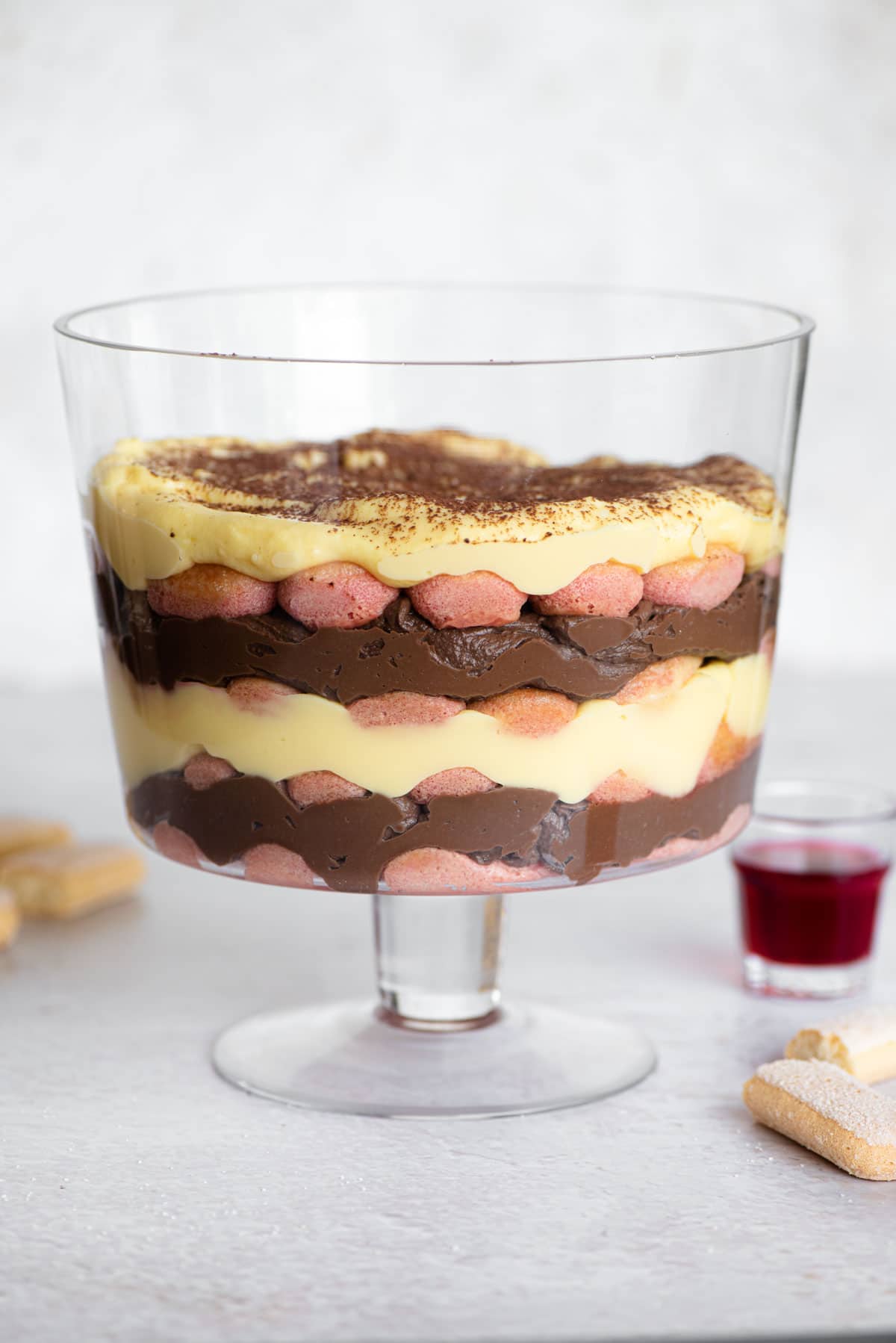 Zuppa inglese (Italian trifle) in a glass trifle dish so you can see all of the layers