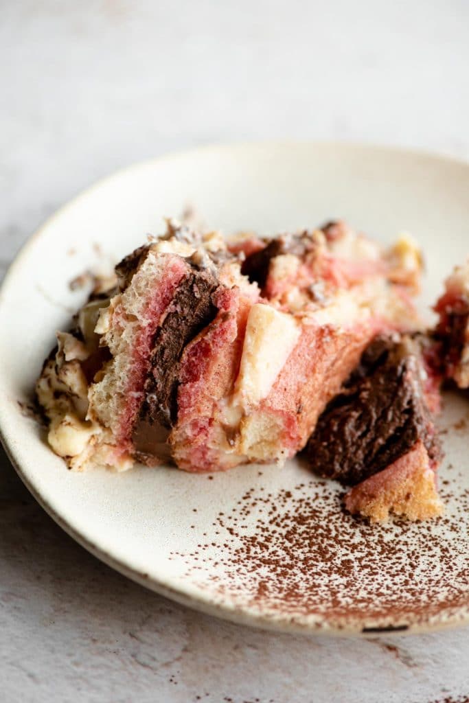 A close up of a slice of zuppa inglese on a plate