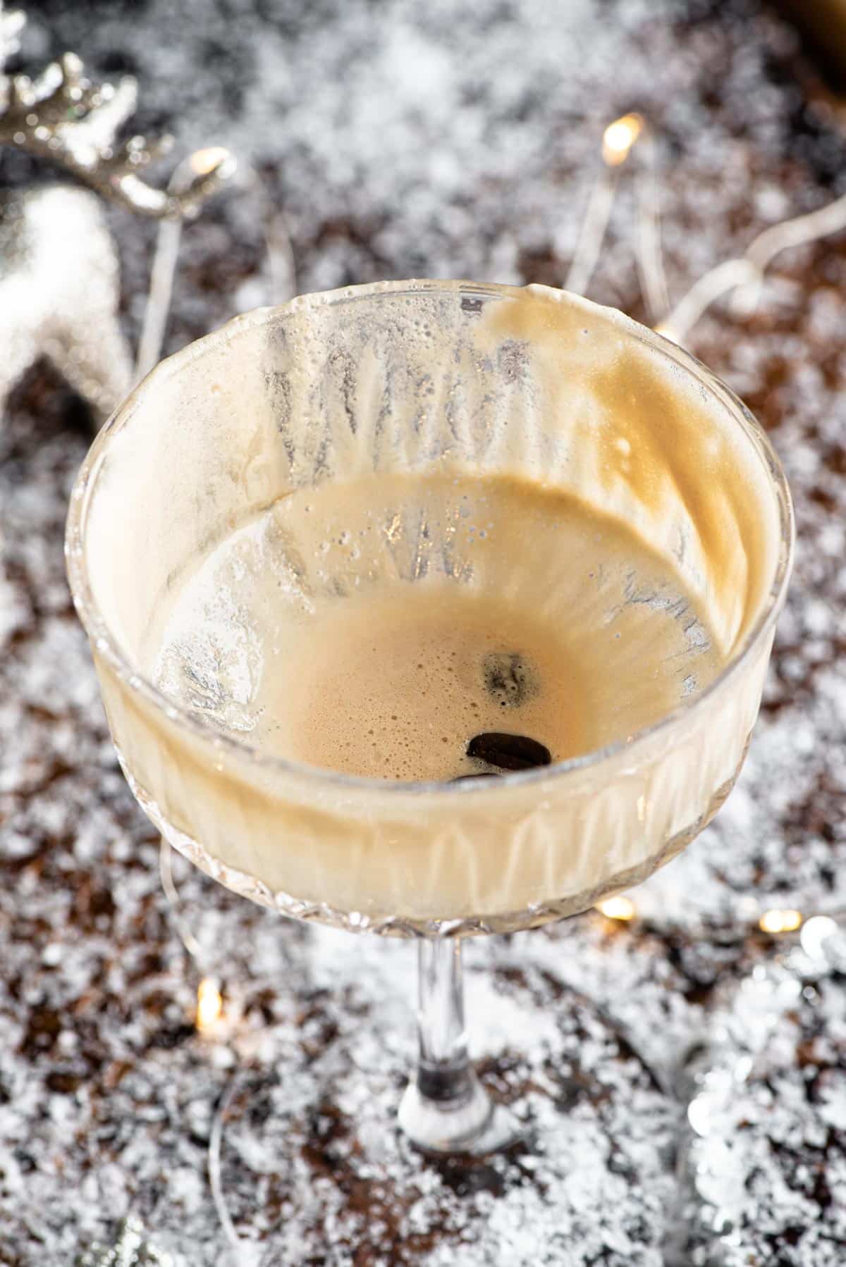 A close up of an empty martini macchiato cocktail