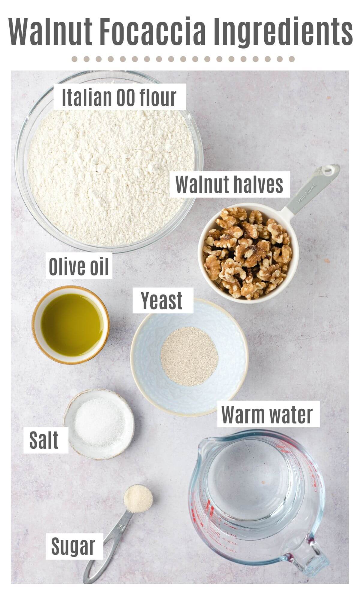 An overhead shot of all the ingredients you need to make a walnut focaccia