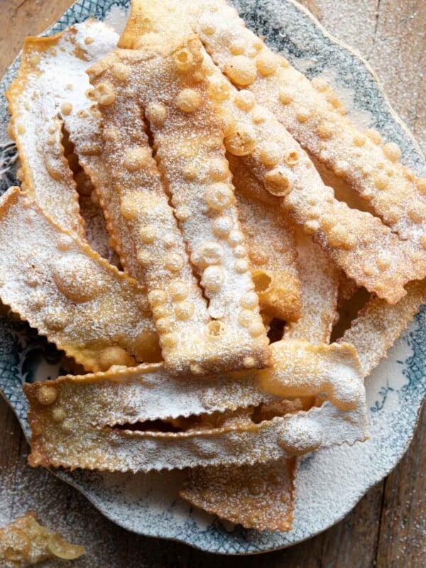An overhead shot of Cenci Italian pastries on a blue plate