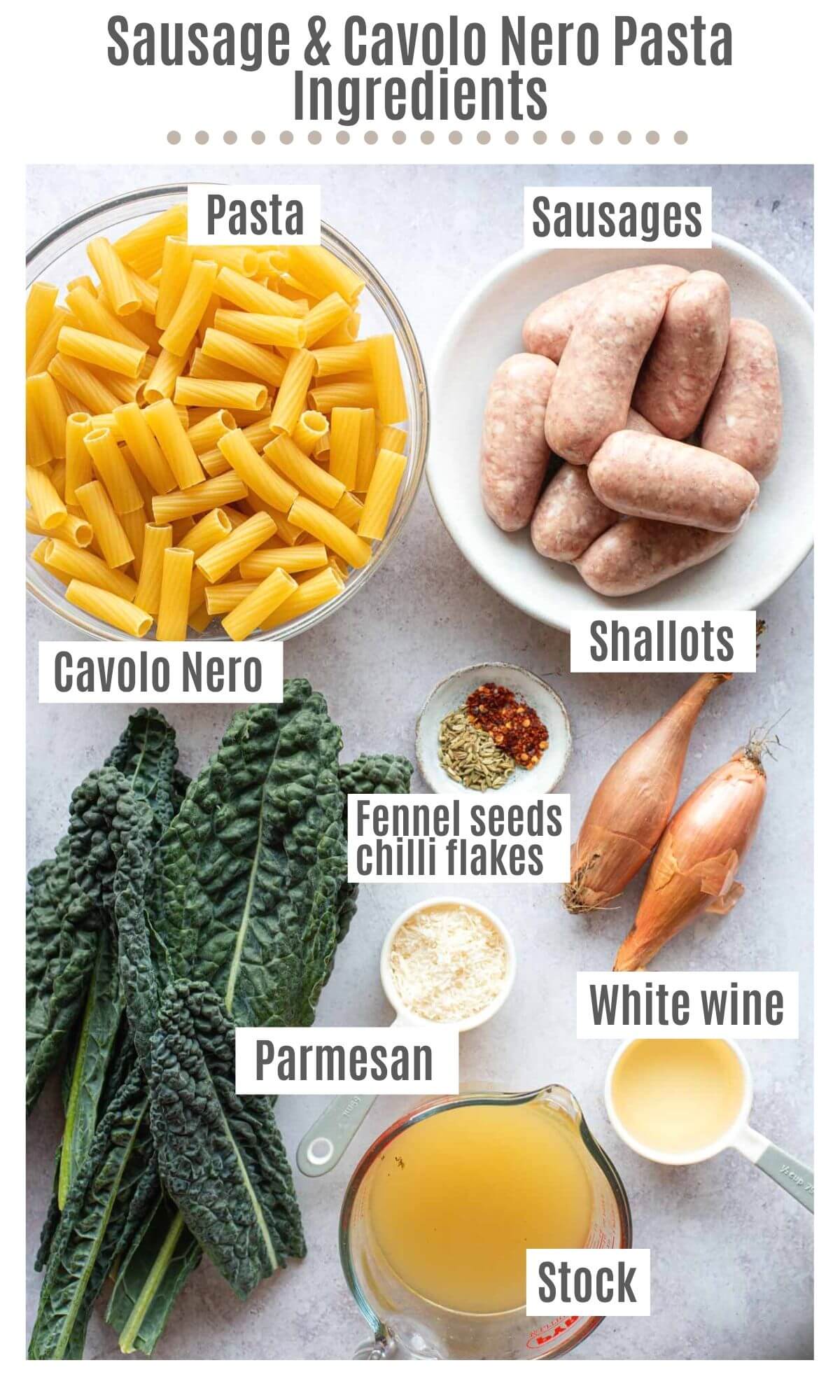 An overhead shot of all the ingredients you need to make sausage and cavolo nero pasta