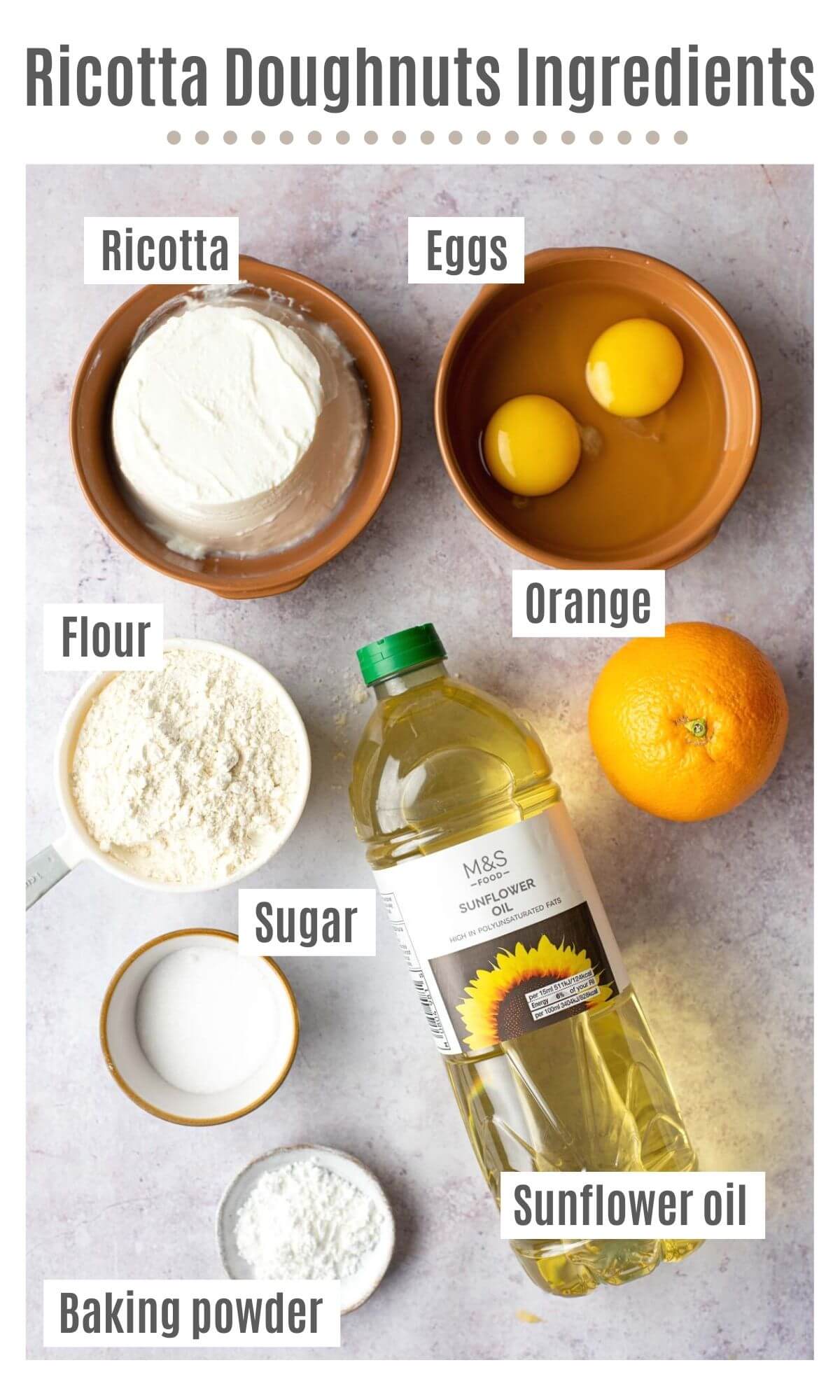 An overhead shot of all the ingredients you need to make Italian ricotta doughnuts with orange zest