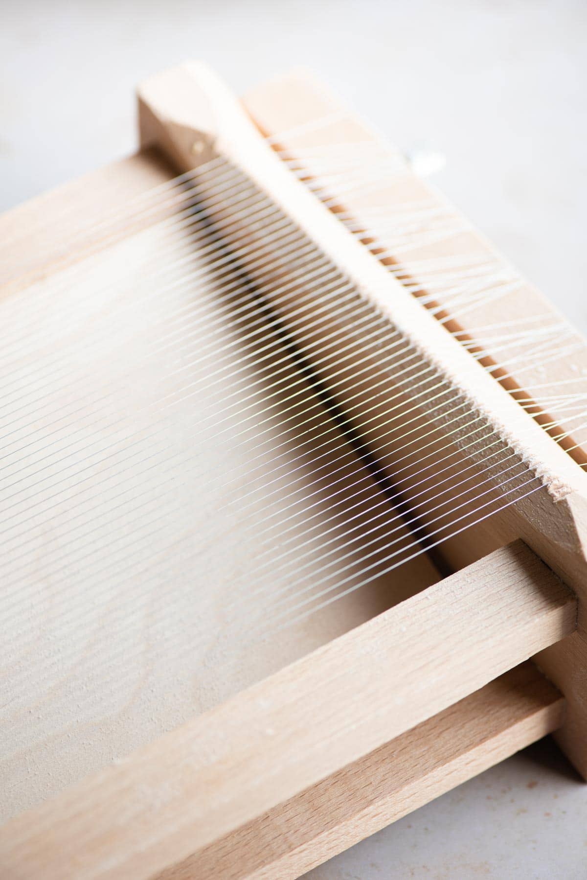 A close up of La Chitarra (guitar) pasta tool