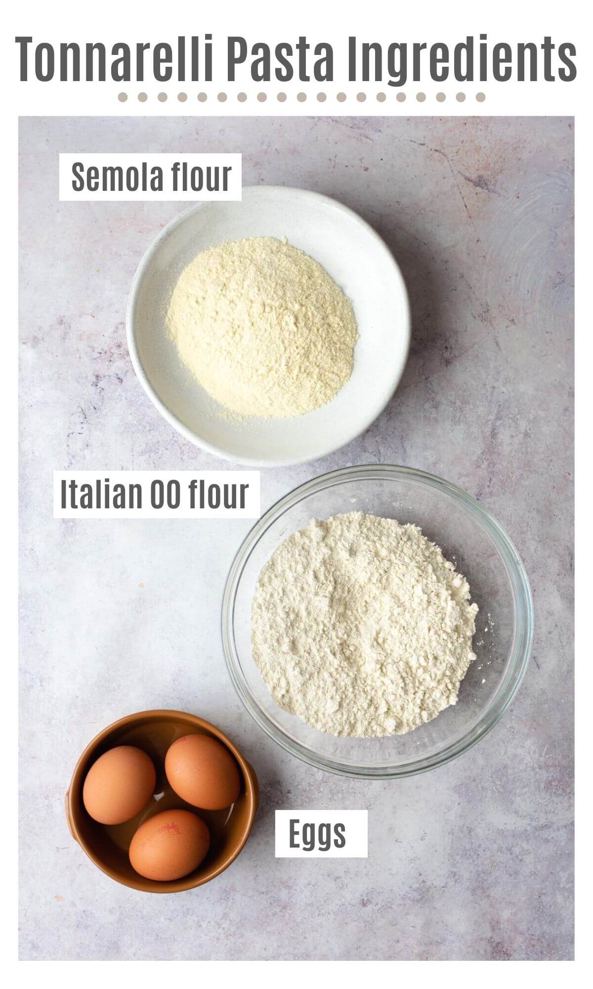 An overhead shot of all the ingredients you need to make tonnarelli pasta