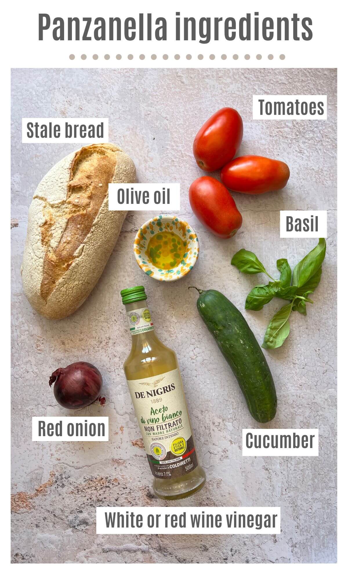 An overhead shot of all the ingredients you need to make an authentic Tuscan Panzanella salad.