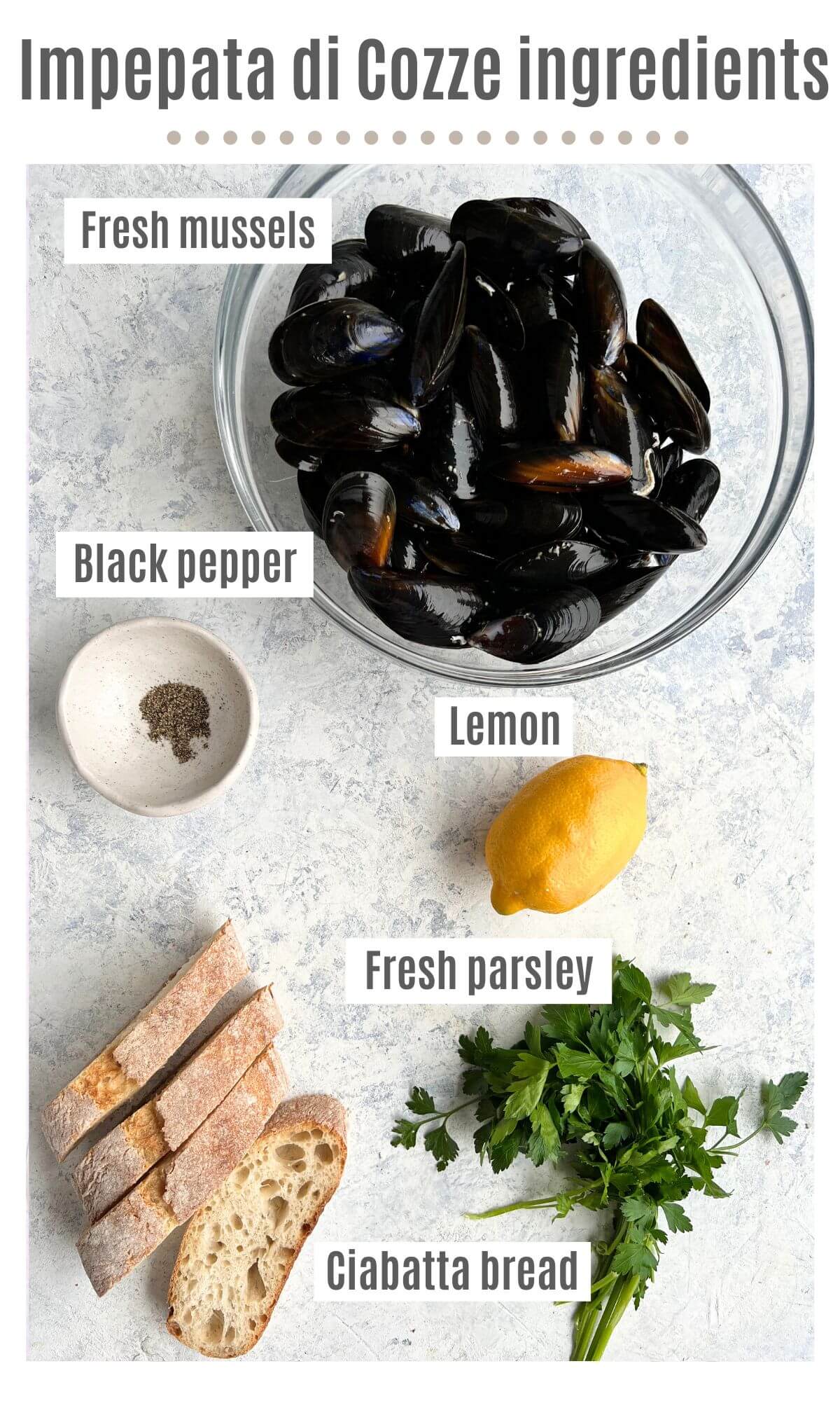 An overhead shot of all the ingredients needed to make Impepata di Cozze (mussels with pepper).