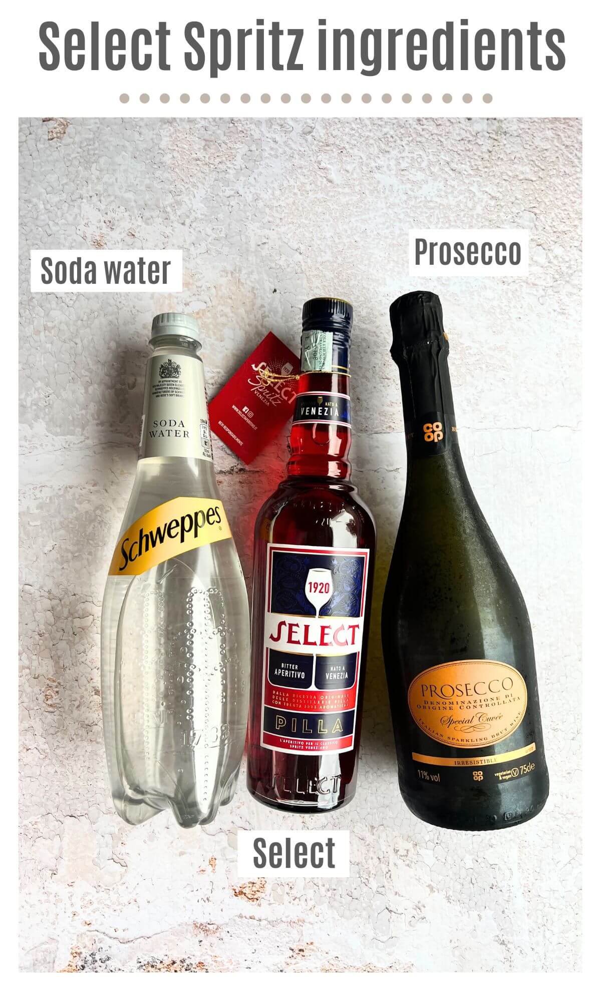 An overhead shot of all ingredients needed to make a Select Spritz cocktail.
