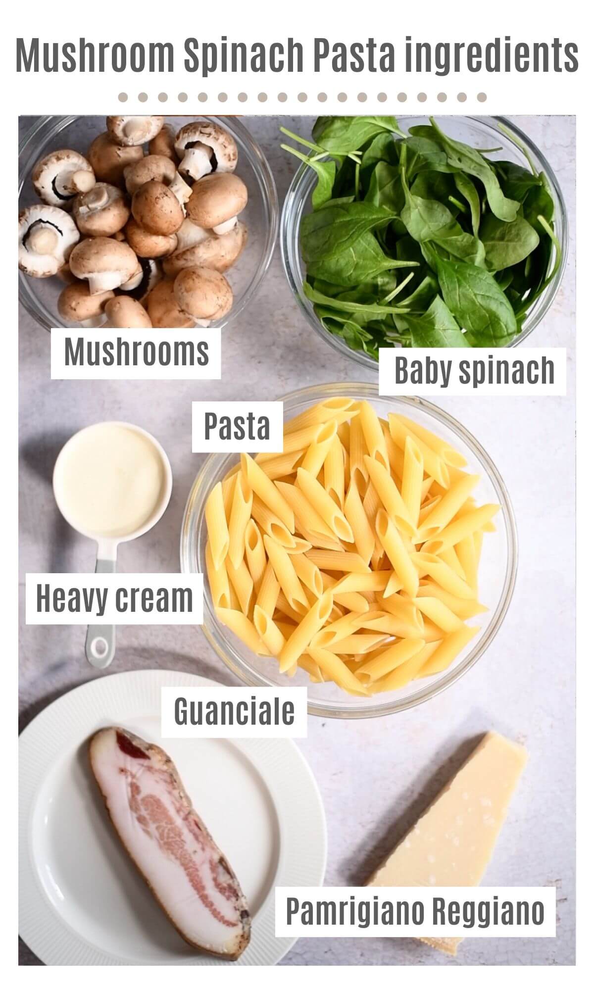 An overhead shot of all the ingredients needed to make mushroom spinach pasta.