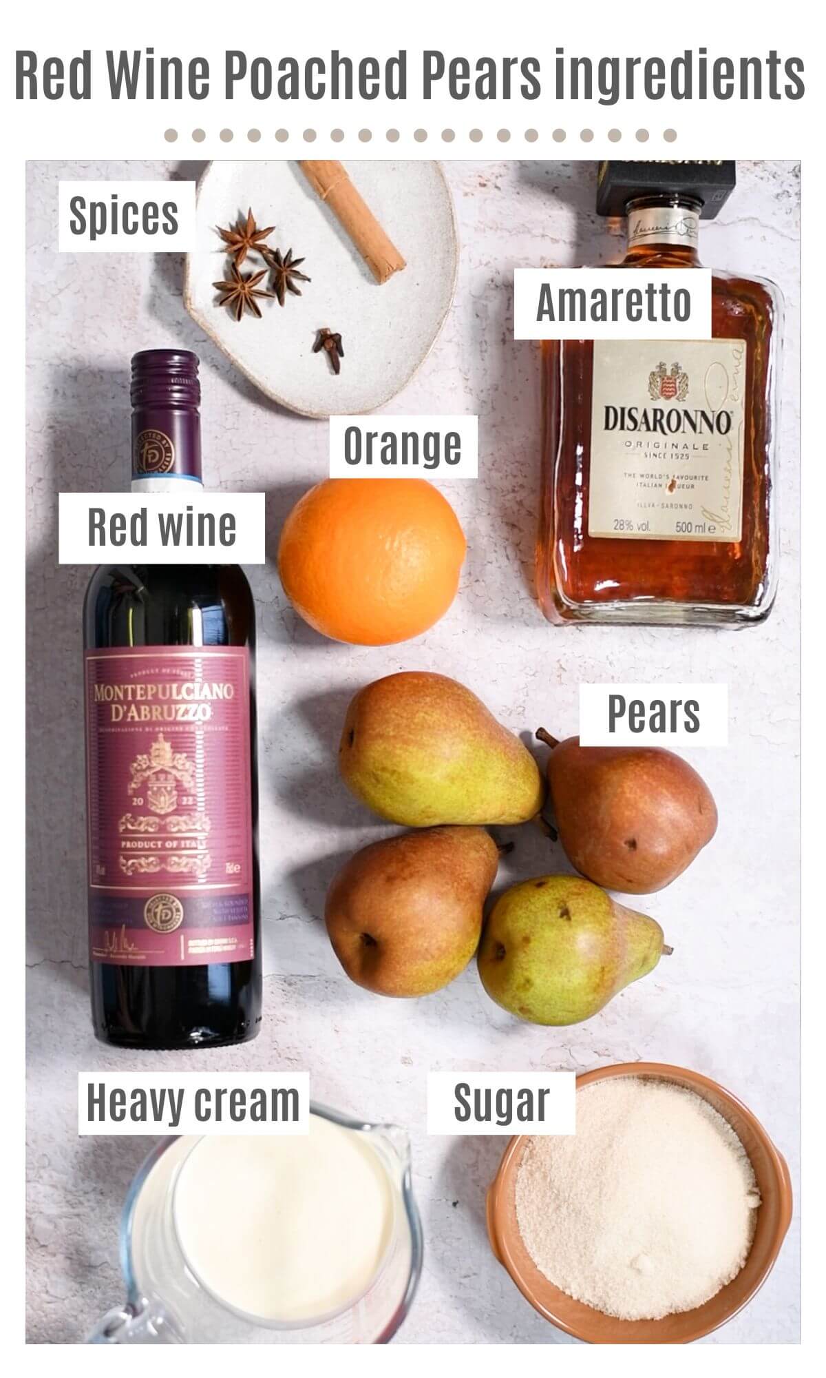 An overhead shot of all the ingredients needed to make red wine poached pears with Amaretto whipped cream.