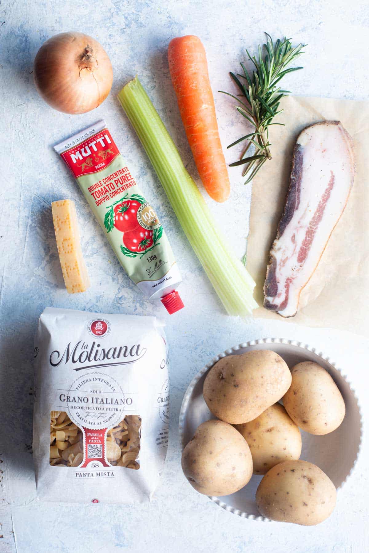 An overhead shot of all the ingredients you need to make Pasta e Patate.