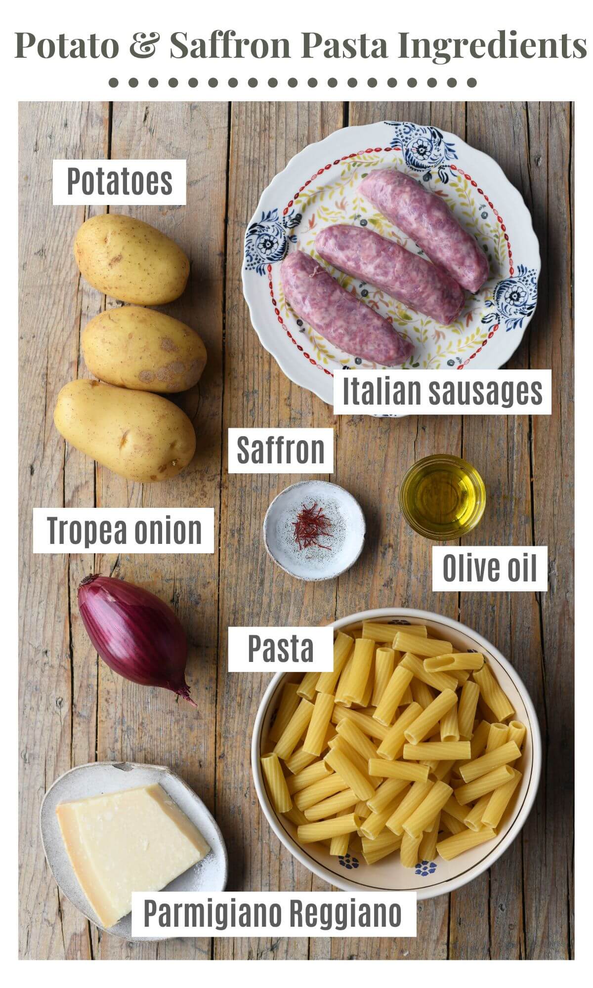 An overhead shot of all the ingredients needed to make a potato, saffron and sausage pasta.