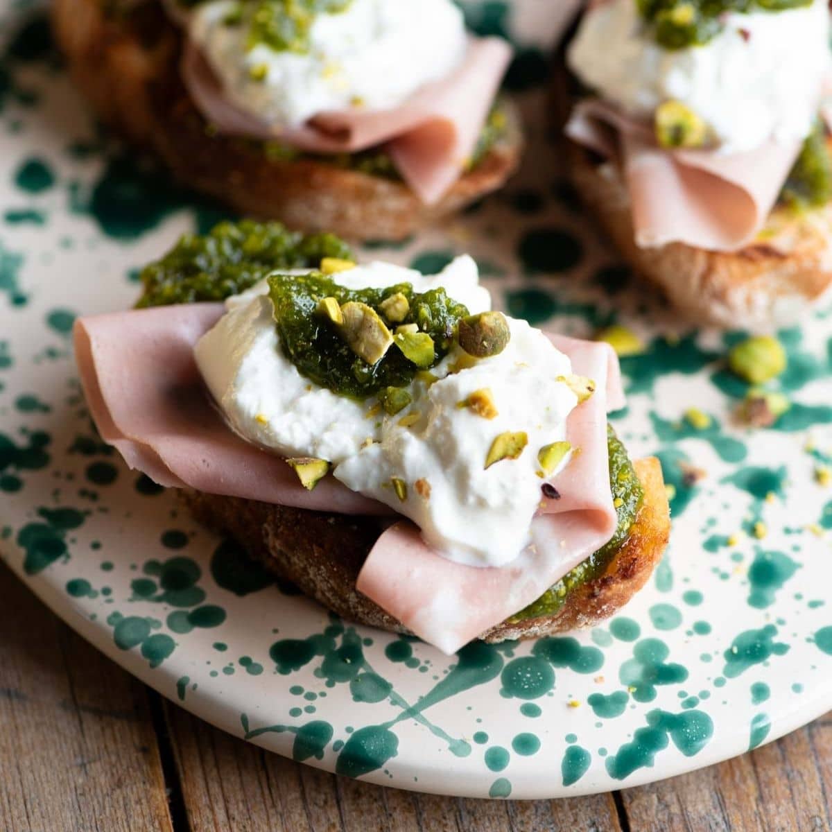 Mortadella, Pistachio and Burrata Crostini
