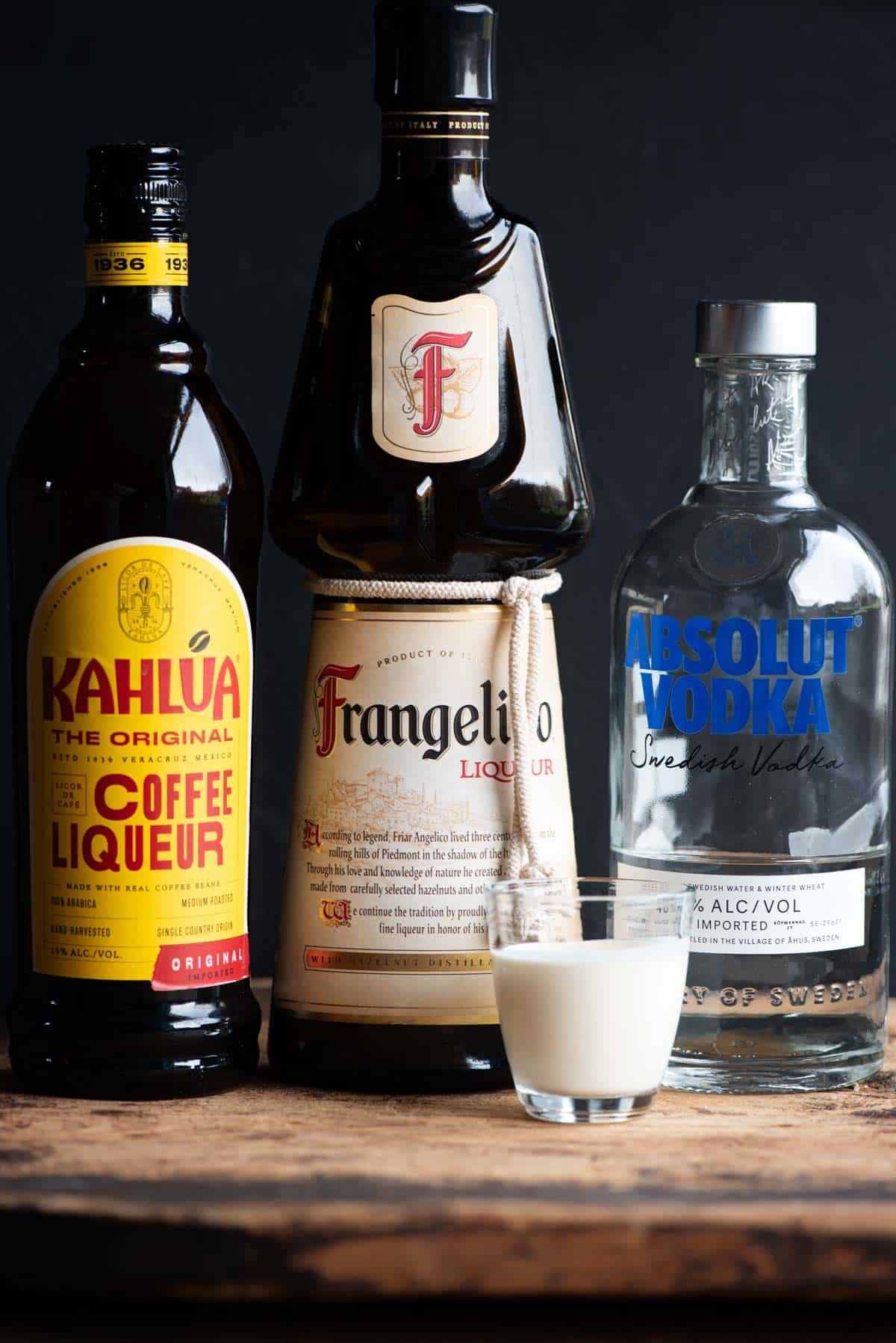 A side shot of all the ingredients you need to make a Frangelico White Russian.
