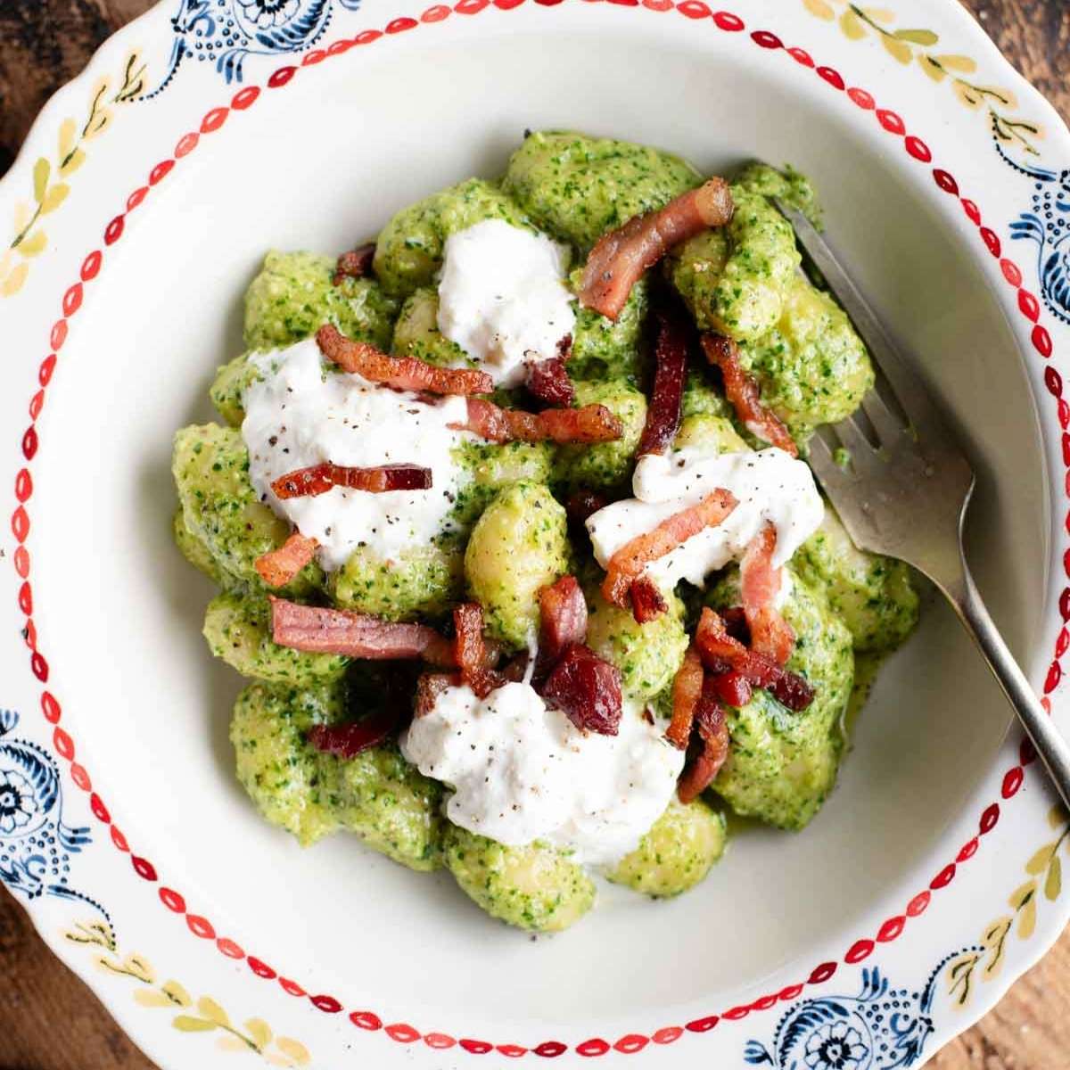 Arugula Pesto Gnocchi with Crispy Pancetta and Burrata