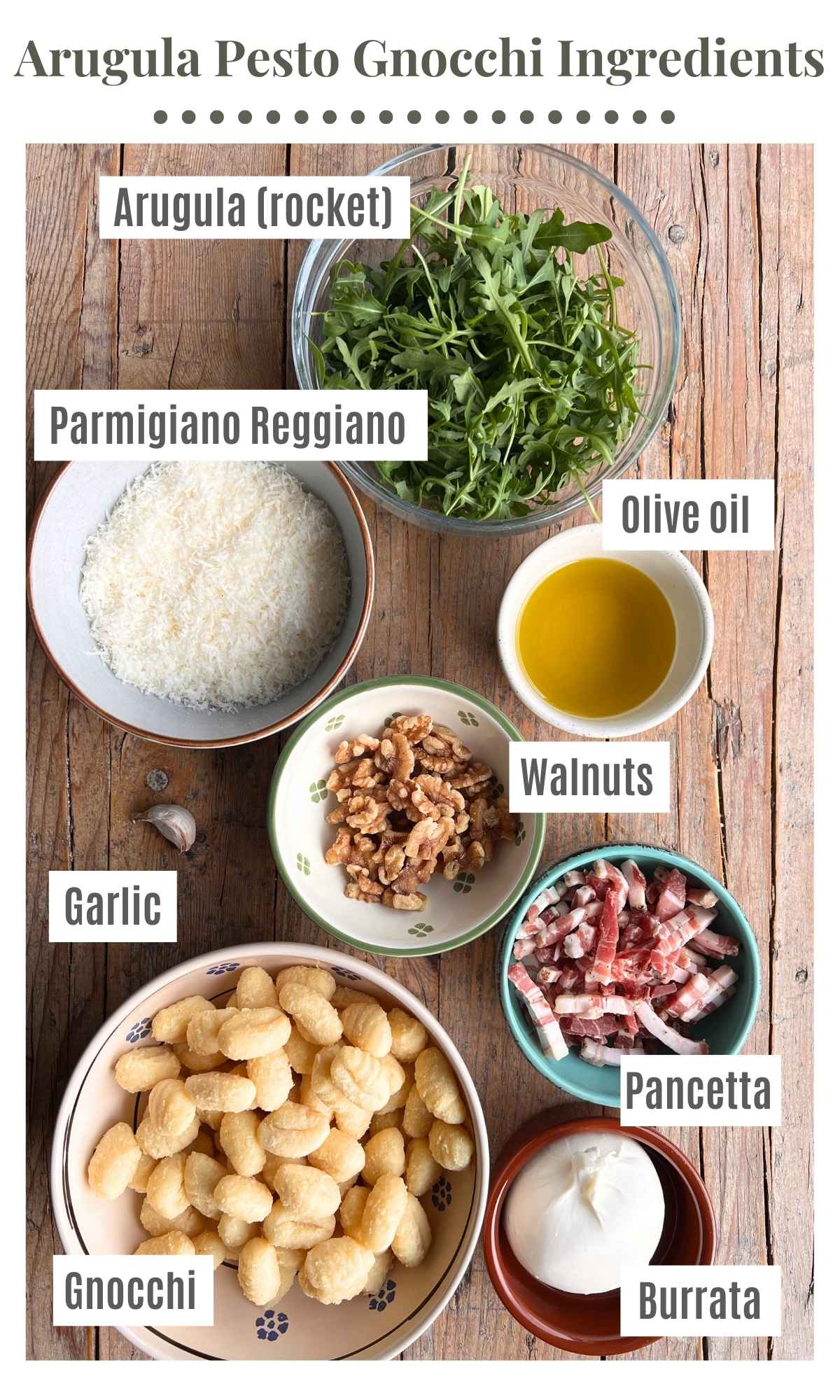 An overhead shot of all the ingredients needed to make gnocchi with arugula pesto, pancetta and burrata.