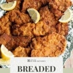A pinterest graphic for breaded pork tenderloin with lemon wedges all around.