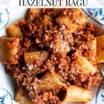 A close up of a bowl of pasta and hazelnut ragu. The text overlay reads: Easy and Delicious Hazelnut Ragu.
