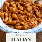 A Pinterest graphic of Italian pasta and lentils in a blue vintage bowl.