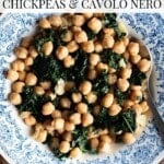 A pinterest graphic showing chickpeas and cavolo nero in a blue and white bowl. The text overlay reads: Garlic Butter Chickpeas and Cavolo Nero.