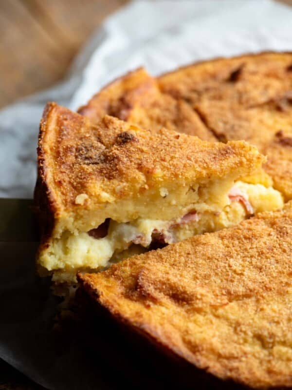 A close up of a slice of Neapolitan potato cake.