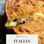 A pinterest graphic showing a slice of Neapolitan potato cake stuffed with meat and cheese getting lifted up from a cake tin.