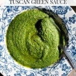 An overhead shot of Tuscan salsa verde in a blue and white bowl. The text overlay reads: Salsa Verde alla Toscana - Tuscan Green Sauce
