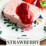A Pinterest graphic showing a slice of strawberry semifreddo on a plate topped with strawberry sauce. The text overlay reads; strawberry semifreddo - get the recipe.