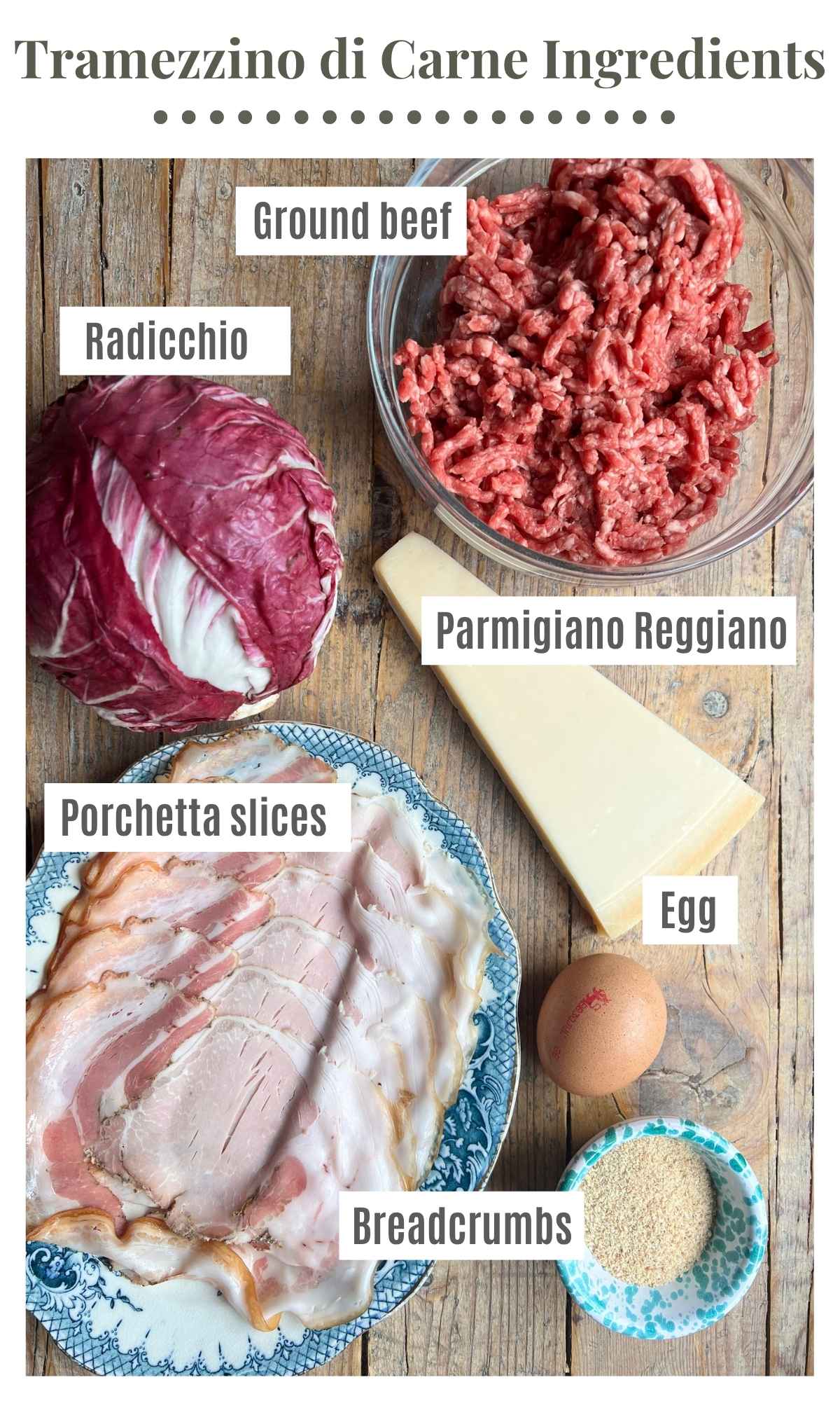An overhead shot showing ground beef, radicchio, parmigiano reggiano, porchetta, egg and breadcrumbs on a rustic wooden surface.