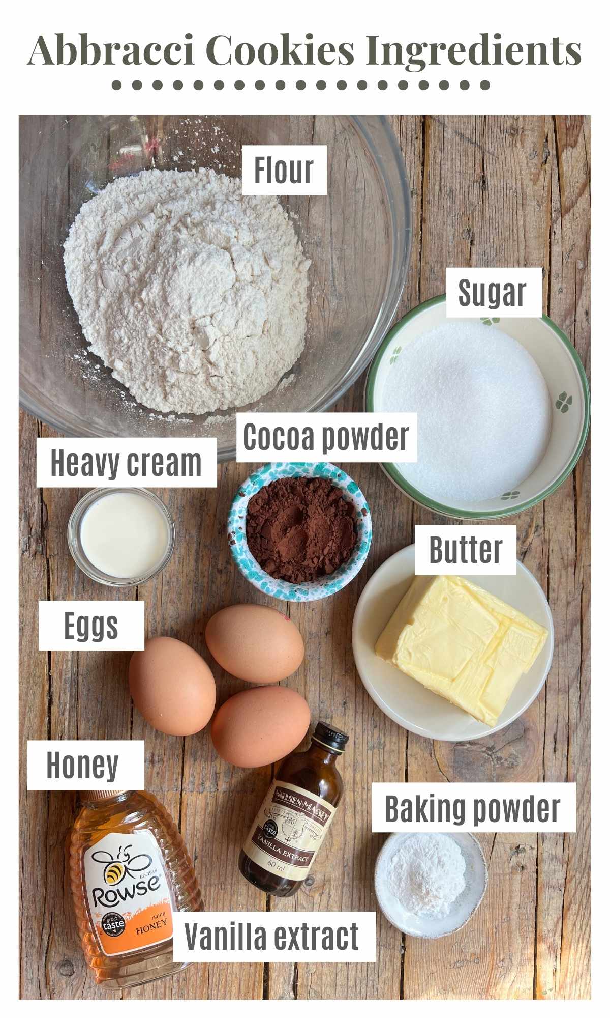An overhead shot showing all the ingredients to make abbracci cookies laying on a rustic wooden surface.