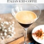 A Pinterest graphic of an iced coffee in a cocktail glass with flowers at the side.