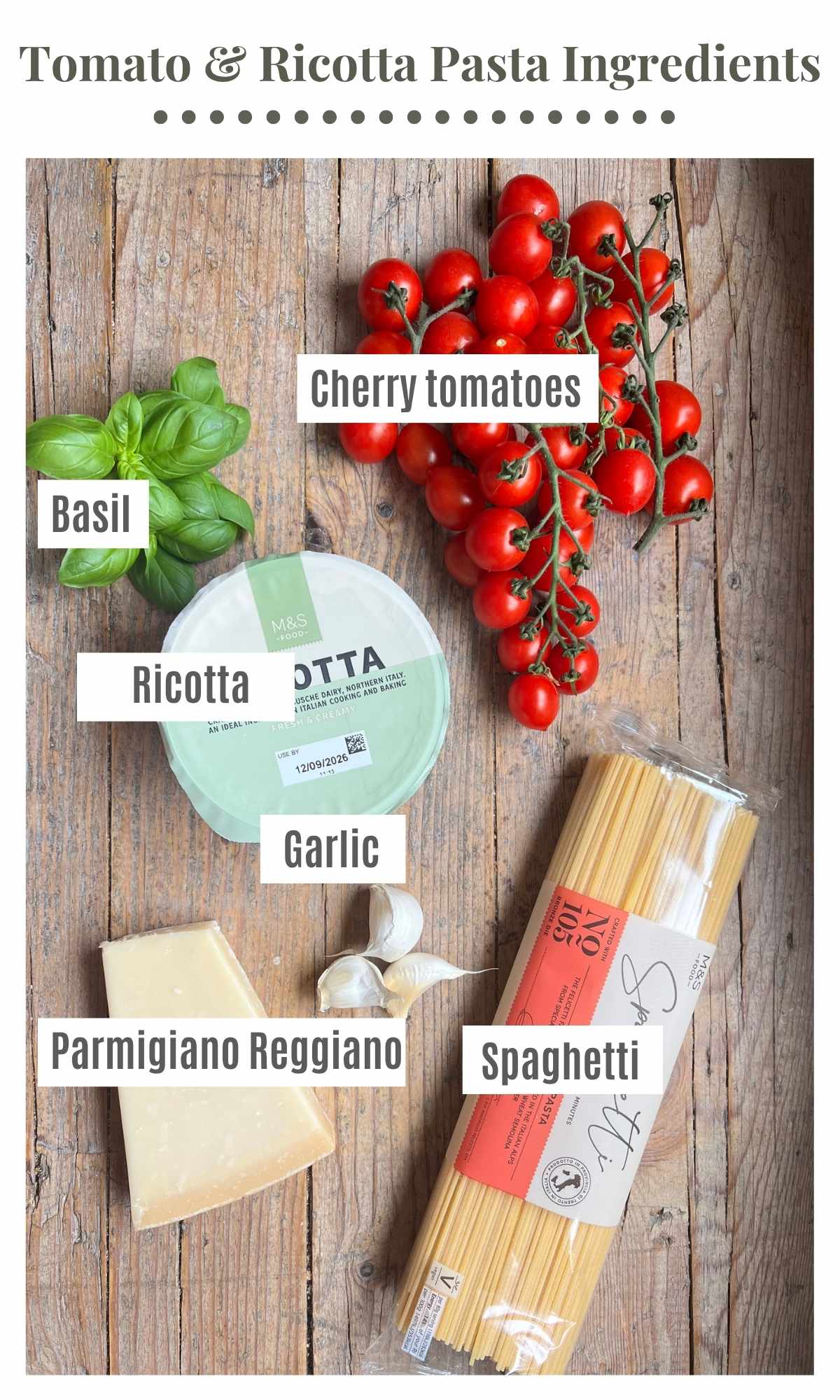 An overhead shot of all the ingredients needed to make roasted cherry tomato and ricotta spaghetti.